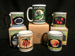 Image of all five variations of the Aylmer Canning Company mugs for sale at the Aylmer Museum.