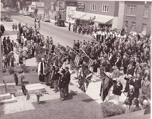 Remembrance Day ceremony, c. 1950. Veterans and Silver Cross Mothers stand at the Aylmer Cenotaph.