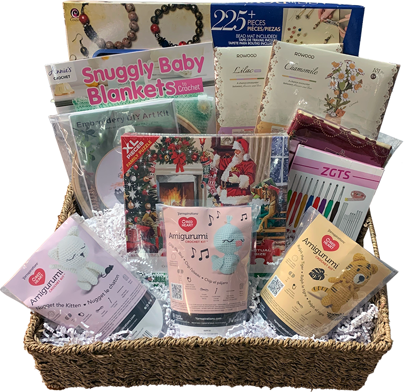 the above-listed items in a wicker basket with decorative shred